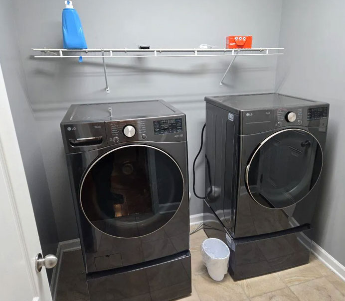 Laundry room with washer and dryer